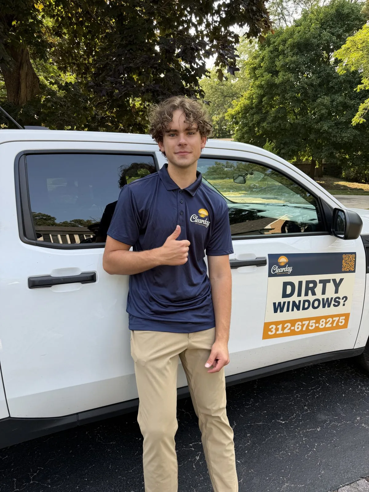ClearDay owner John Mlicki beside a ClearDay service truck